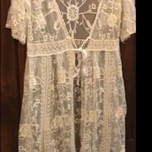 Duster creamy color over dress